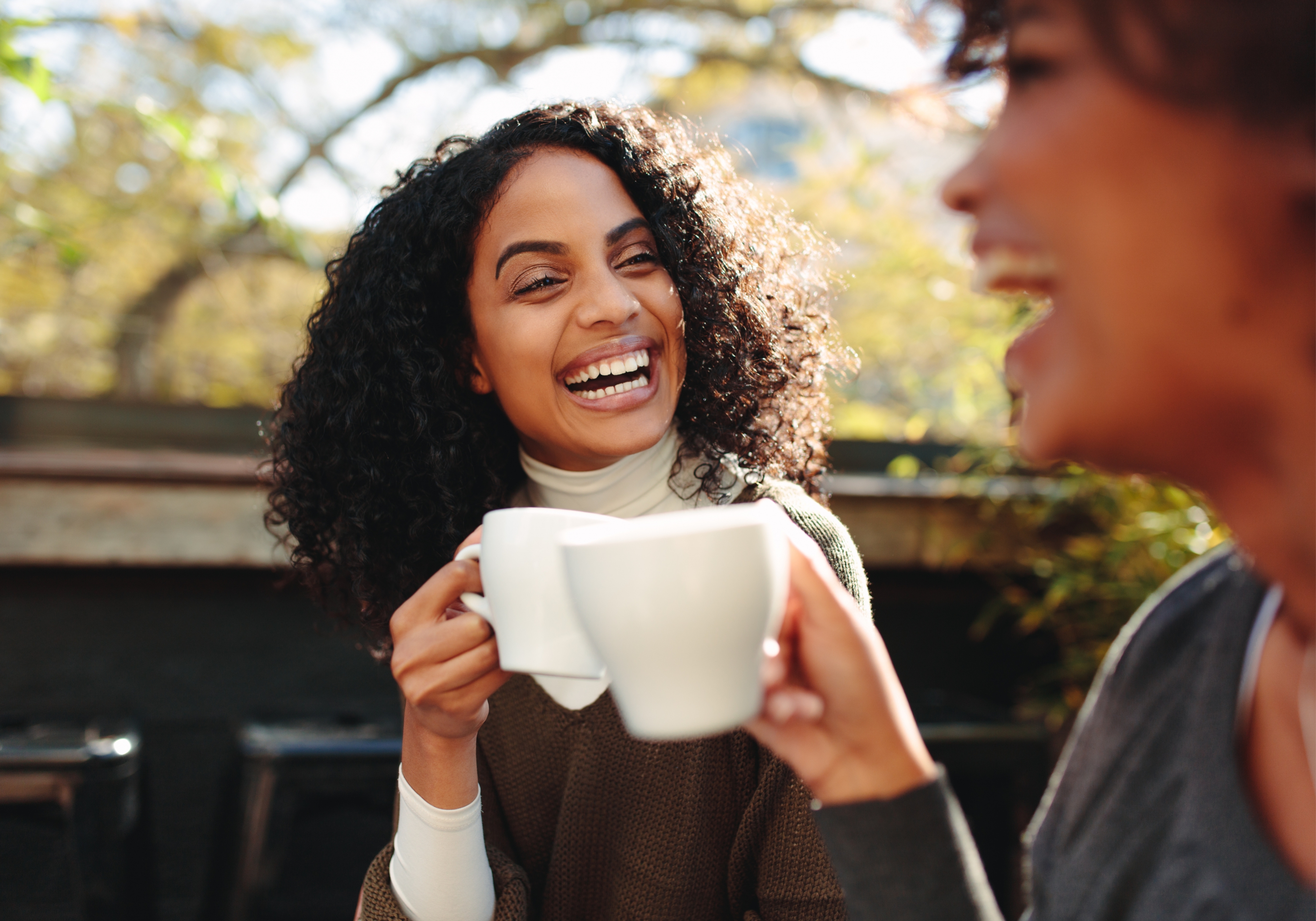 Image Two Women Drinking Coffee